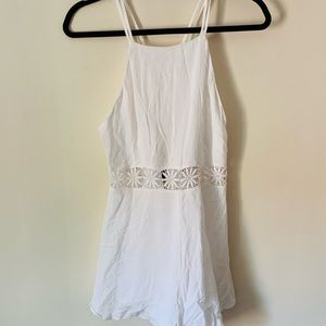 The cutest light weight romper with lace detail
